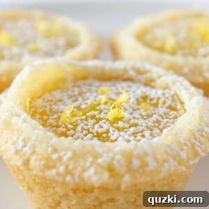 Lemon Bar Cookie Cups Recipe with the Best Sugar Cookie Mix featured by top US cookie blogger, Practically Homemade
