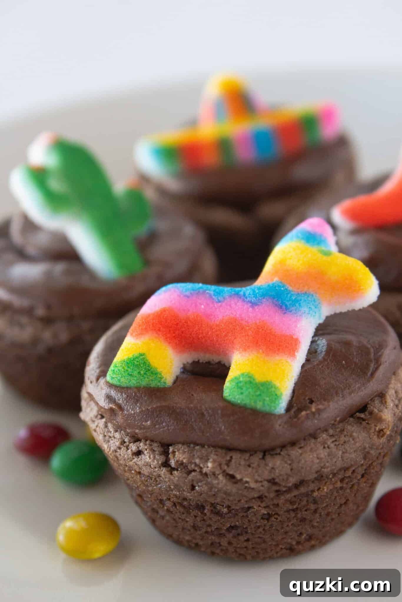 Cake Mix Shortcut Pinata Cookies 2 Delicious Pinata Cookies made with chocolate cake mix and chocolate frosting, ready to be enjoyed.