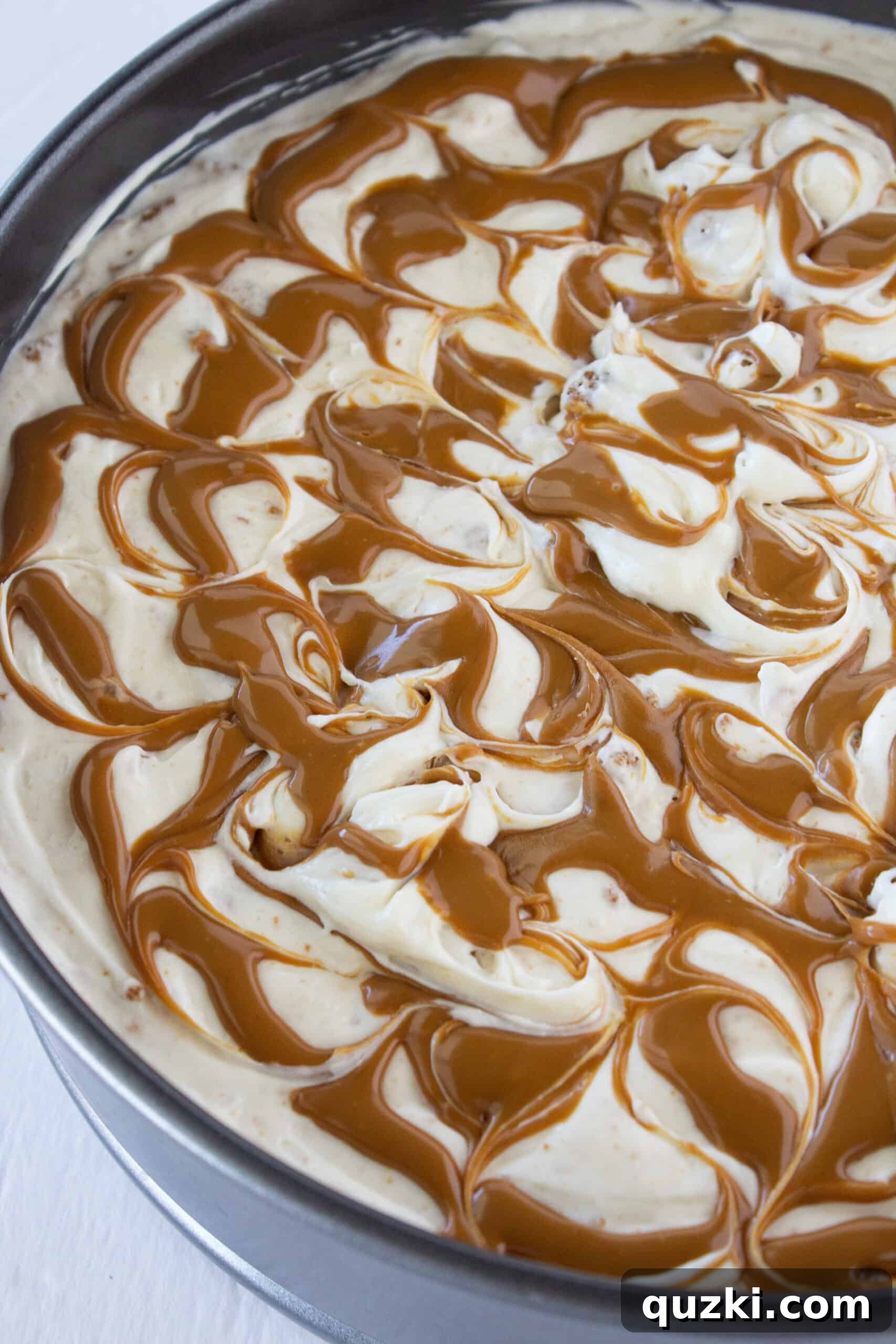 Decadent Cookie Butter No-Bake Cheesecake 12 Chilled Cookie Butter No Bake Cheesecake in a springform pan, ready to be removed