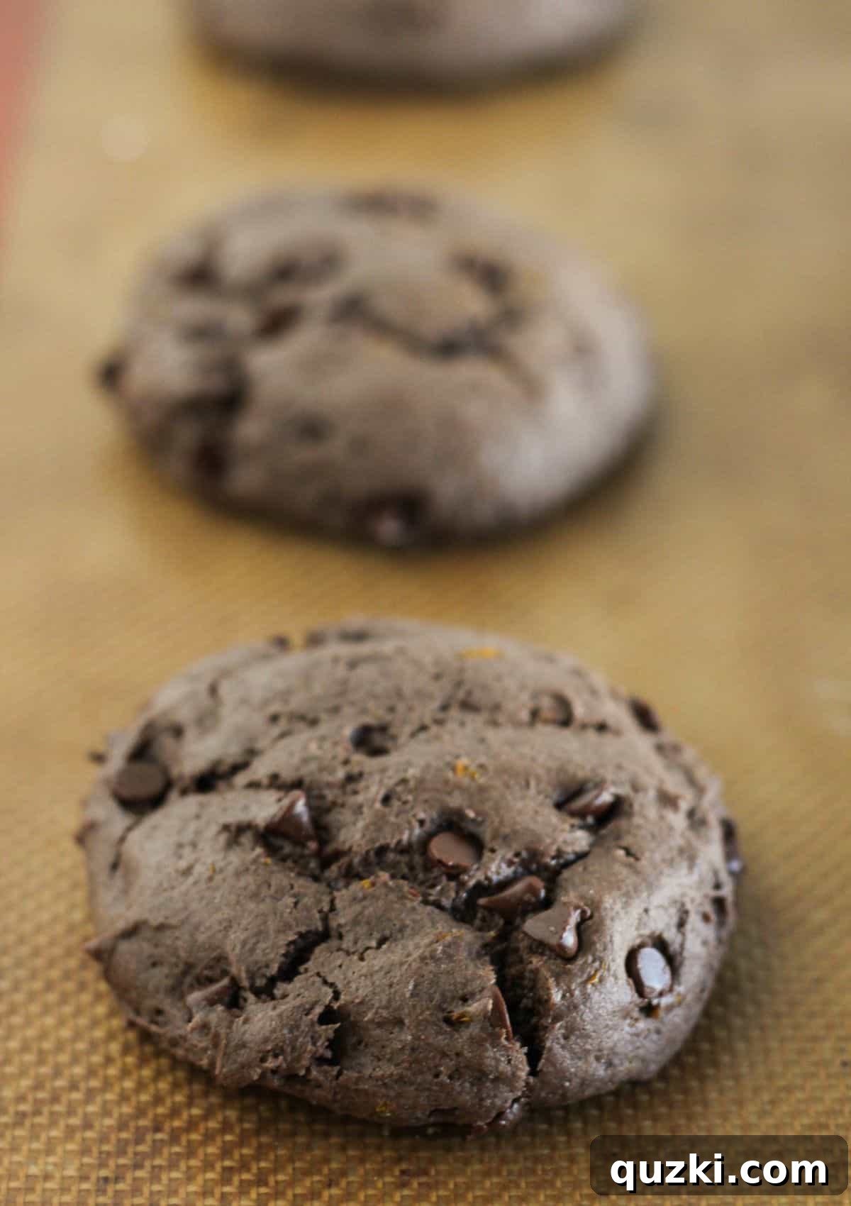 Chocolate Orange Cookie Mix Recipe — Quick Cake Mix Cookies 6 Baked chocolate orange cookies on baking sheet cooling.