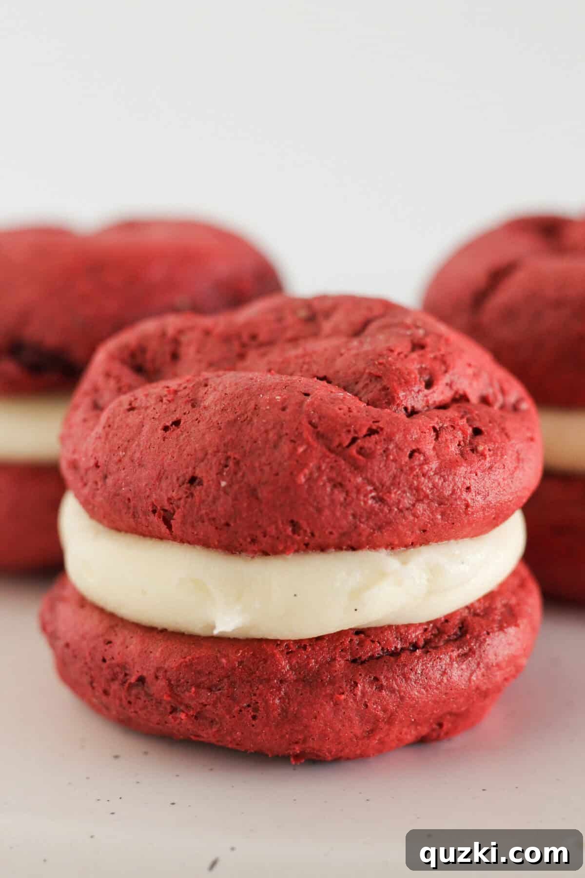 Red Velvet Whoopie Pies Made with Cake Mix 9 Finished red velvet whoopie pies with cream cheese frosting.
