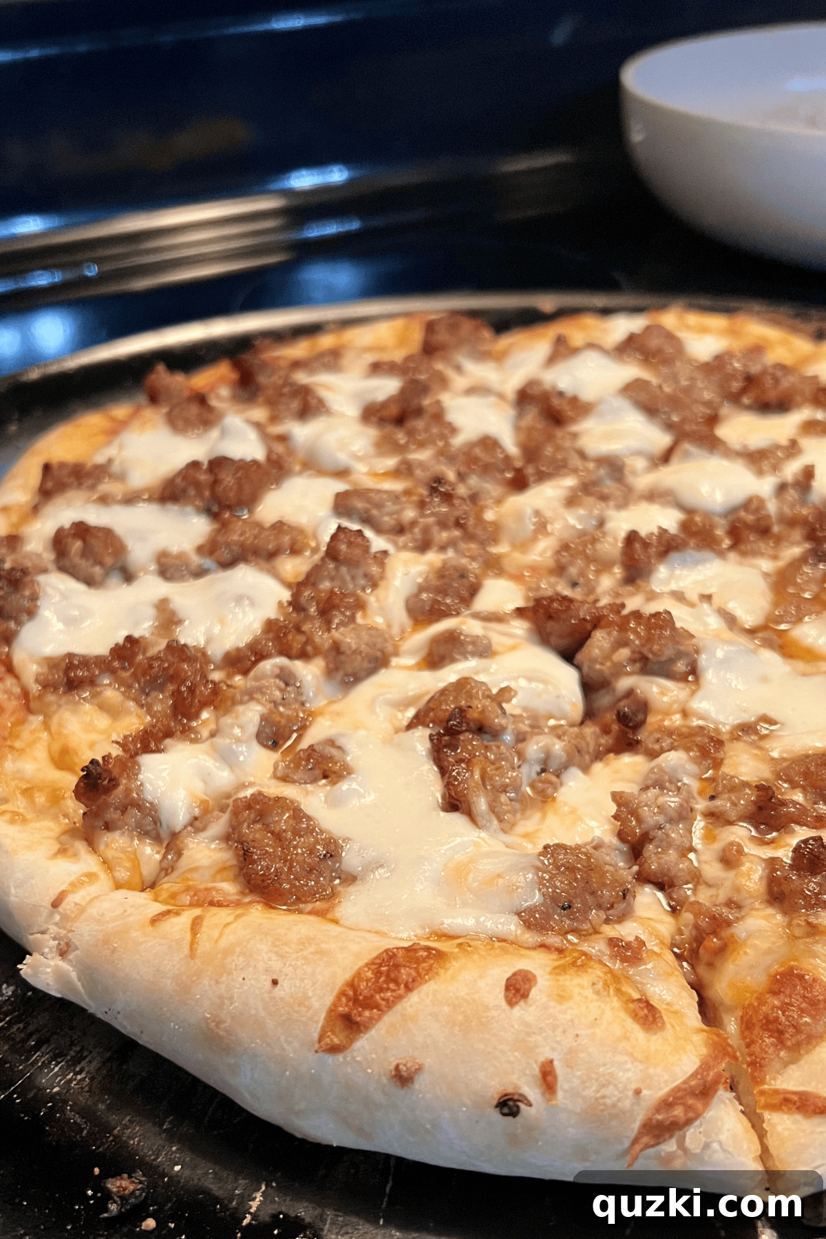 Pizza straight from the oven and ready to serve.