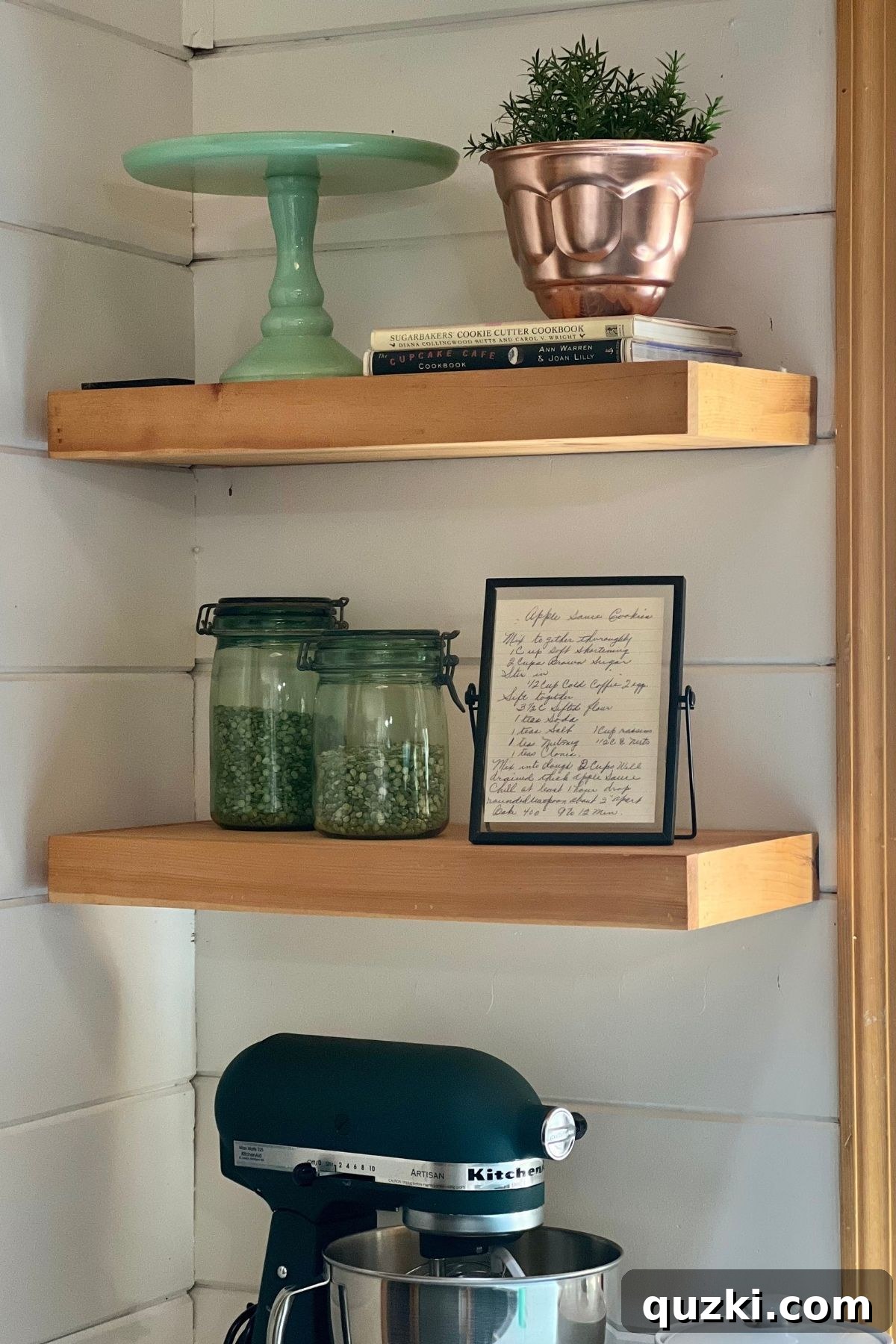 Shelving in my kitchen with a framed recipe from my grandma.